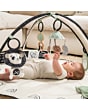 TL3150BWDDG_3333120921_2023_Tinylove_playmat_Gymini_B&WDecor_lifestyleimage_babylyingdowncatchingrattle3000
